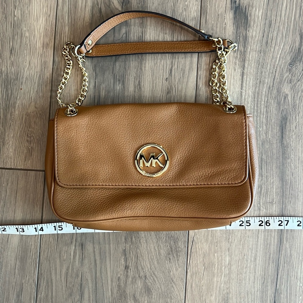 Michael kors Fulton small strap handbag. Priced to sell gently used see pics